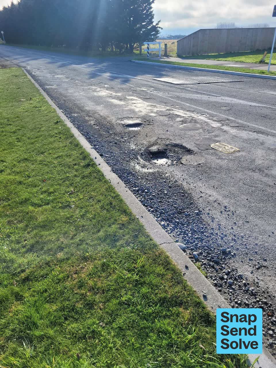 The photograph attached to this pothole report