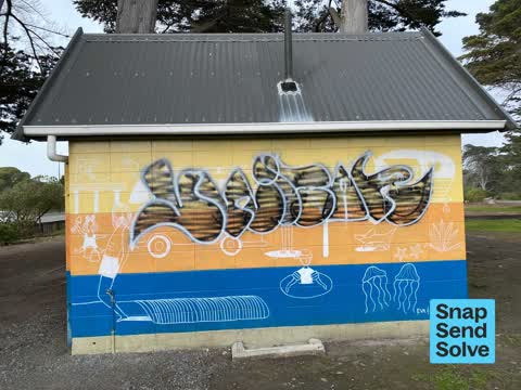 Graffiti on a bus stop or public toilet — a report photo