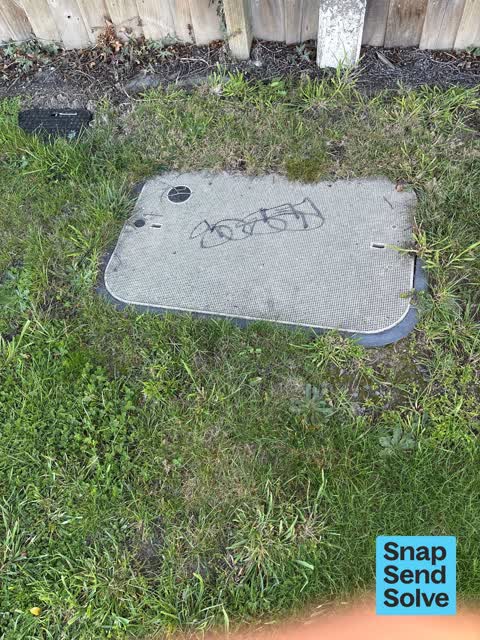 Graffiti on a fence, building or structure — a report photo