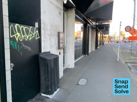 Graffiti on a fence, building or structure — a report photo