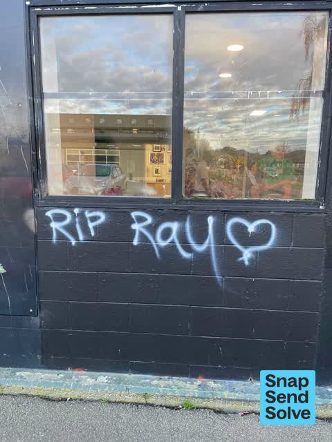 Graffiti on a fence, building or structure, a report photo