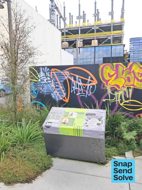Graffiti on a fence, building or structure, a report photo