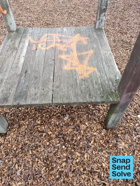 Graffiti on a playground or in a park, a report photo