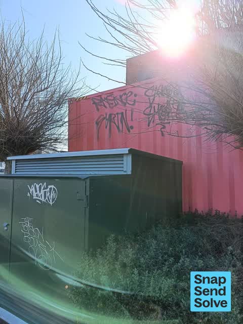 Graffiti on a fence, building or structure, a report photo