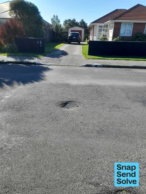 Pothole, a report photo