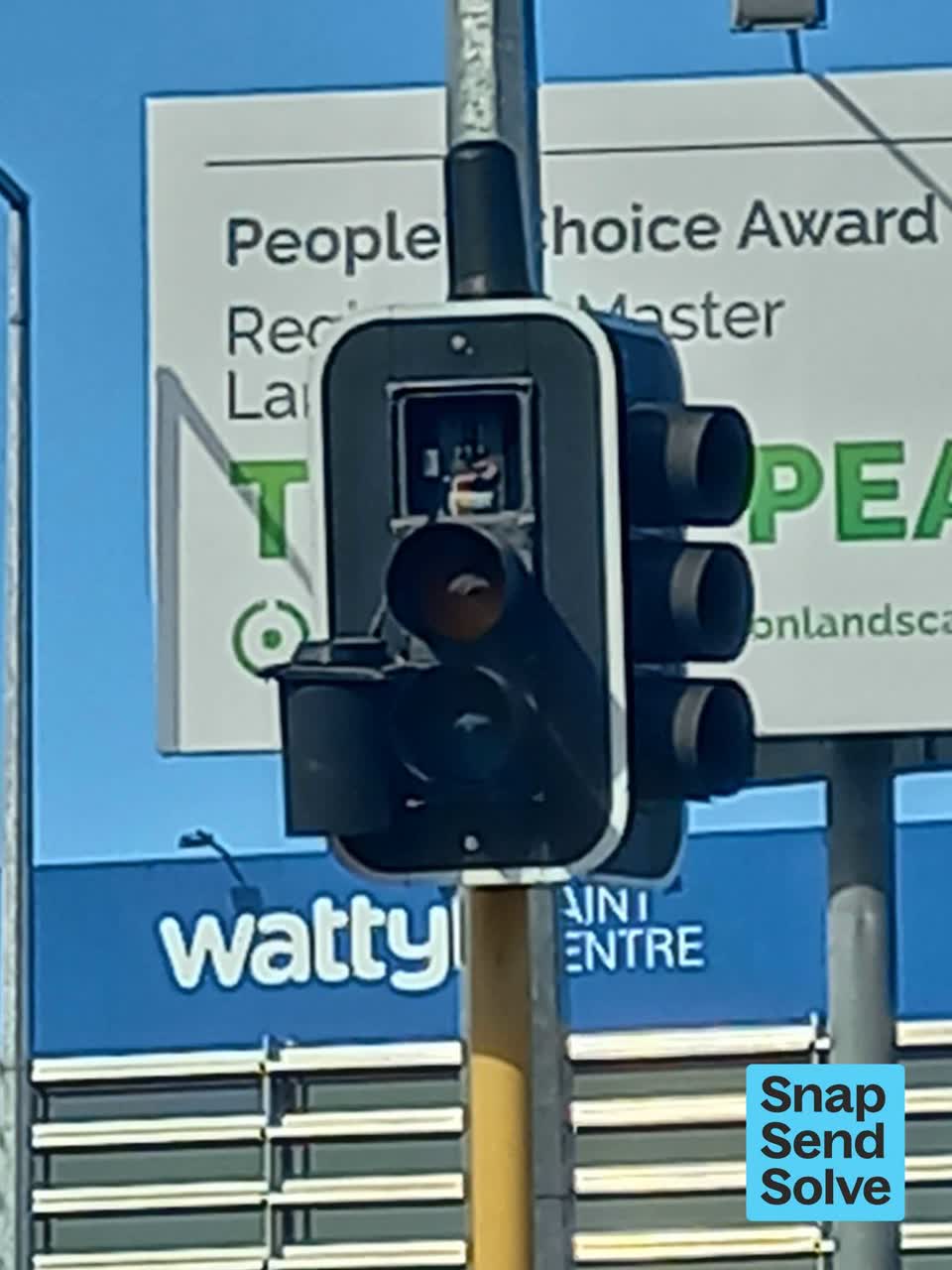 The photograph attached to this damaged street sign report