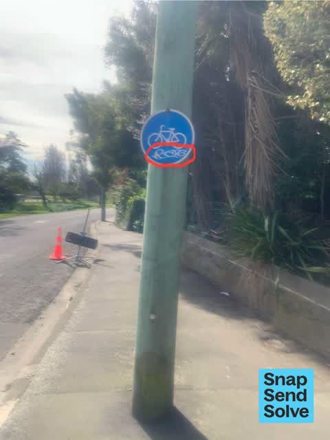 Graffiti on a sign, mural or public art, a report photo