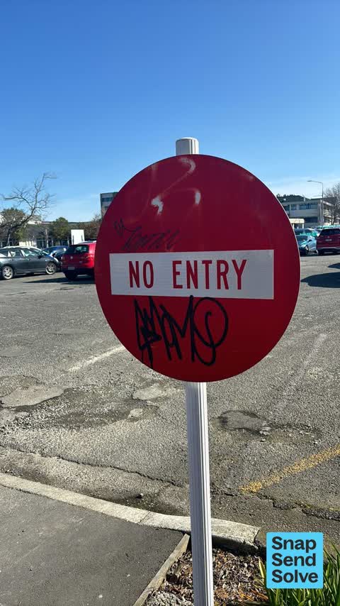 Graffiti on a sign, mural or public art, a report photo