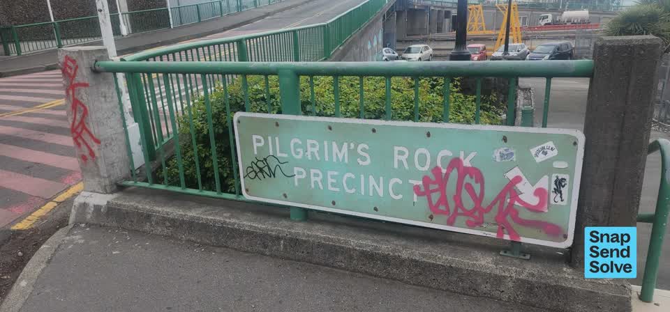 The photograph attached to this graffiti on a sign, mural or public art report