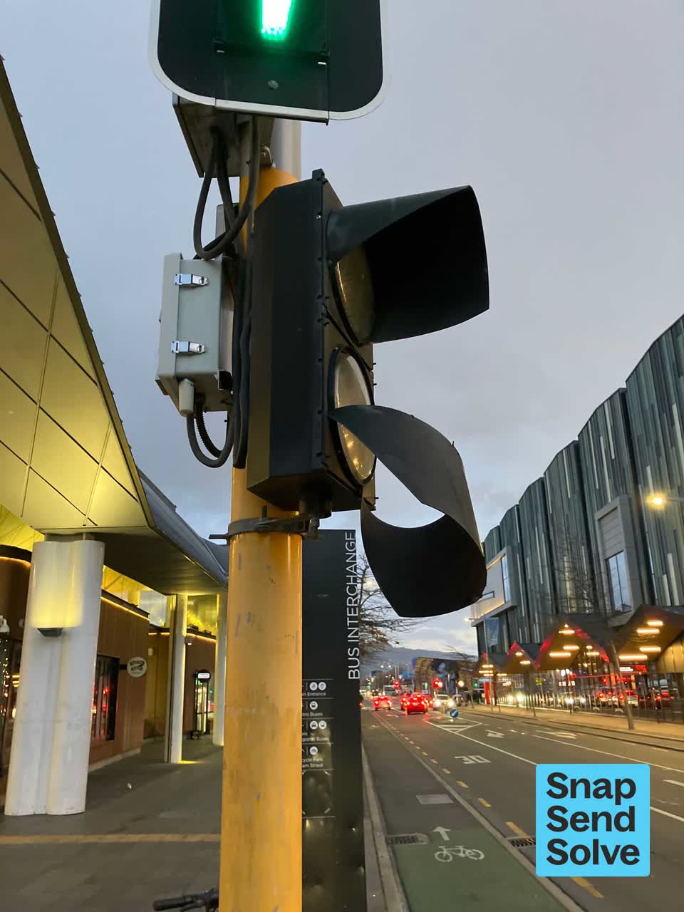 The photograph attached to this damaged street sign report