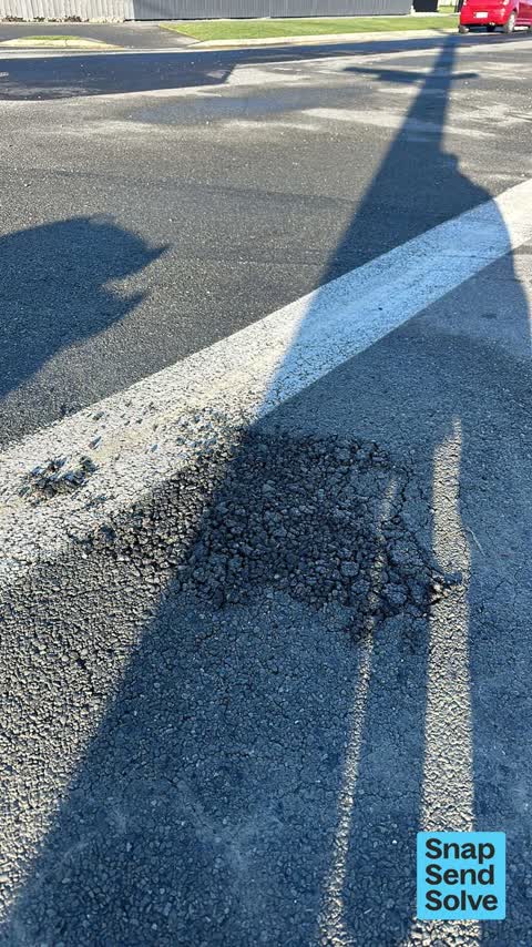 Pothole, a report photo
