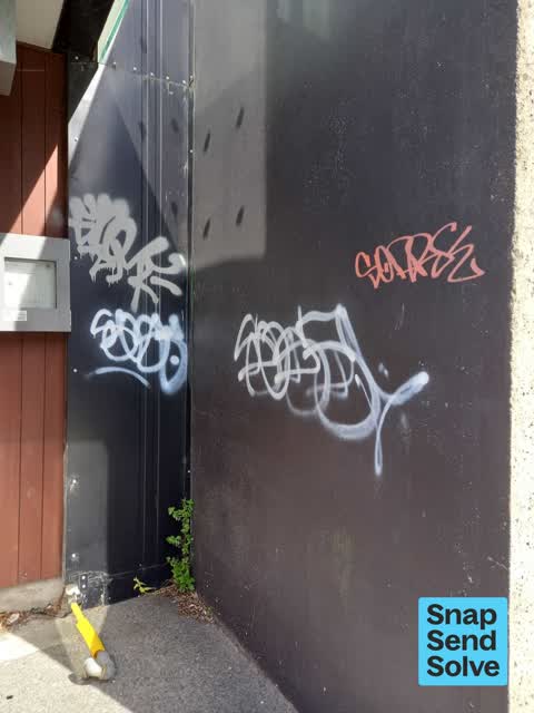 Graffiti on a fence, building or structure — a report photo