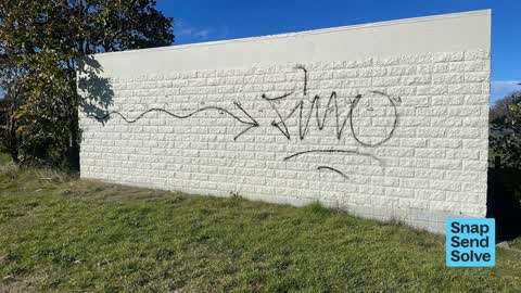 Graffiti on a fence, building or structure — a report photo
