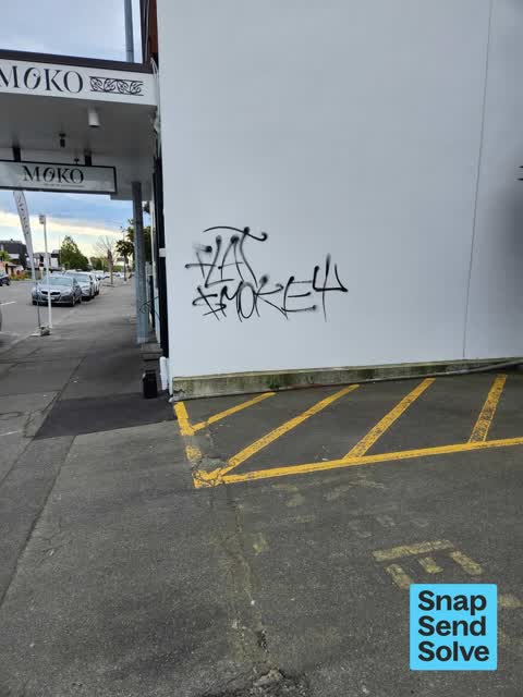 Graffiti on a fence, building or structure, a report photo