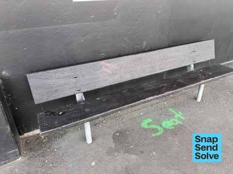 Graffiti on a bus stop or public toilet, a report photo