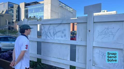 Graffiti on a fence, building or structure — a report photo