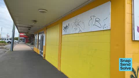 Graffiti on a fence, building or structure, a report photo