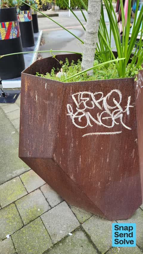 Graffiti on a fence, building or structure — a report photo