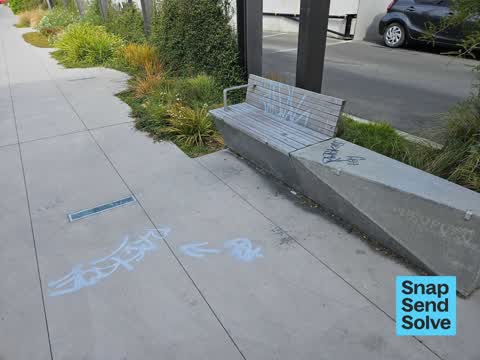 Graffiti on a sign, mural or public art, a report photo
