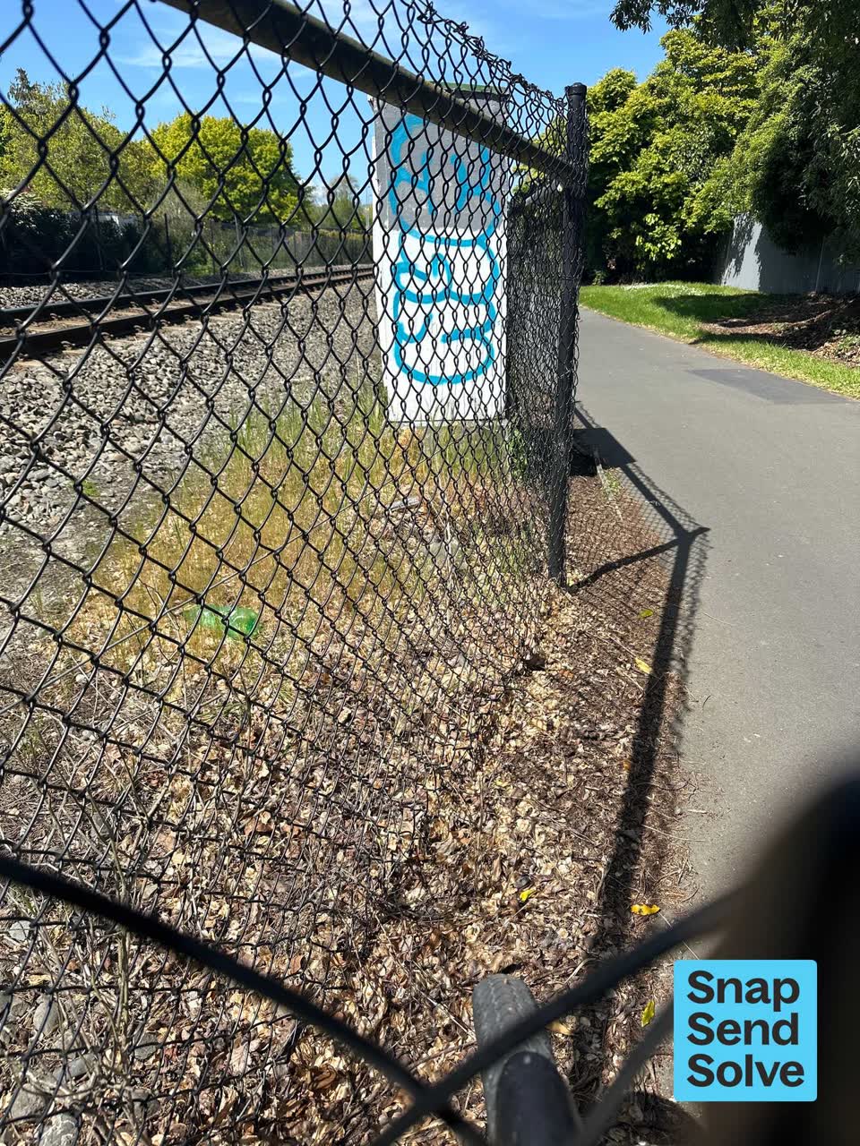 The photograph attached to this graffiti on a cabinet, pole or railway asset report