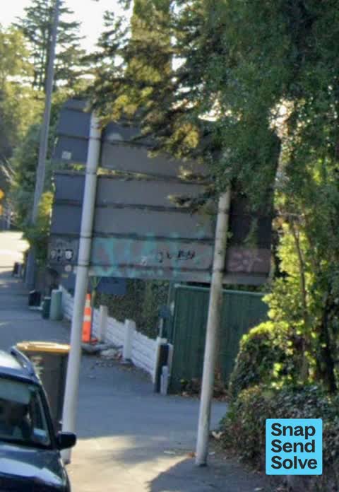 Graffiti on a sign, mural or public art, a report photo