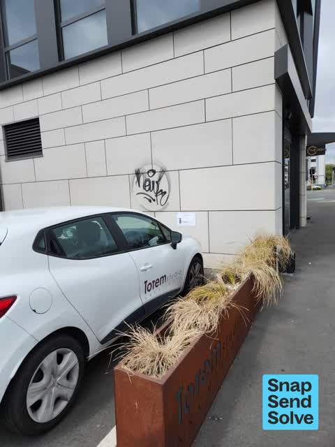 Graffiti on a fence, building or structure, a report photo