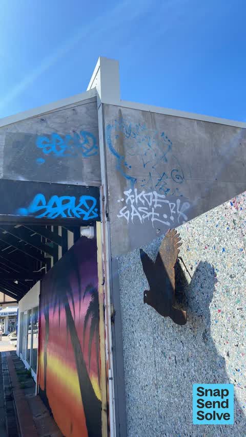 Graffiti on a fence, building or structure — a report photo