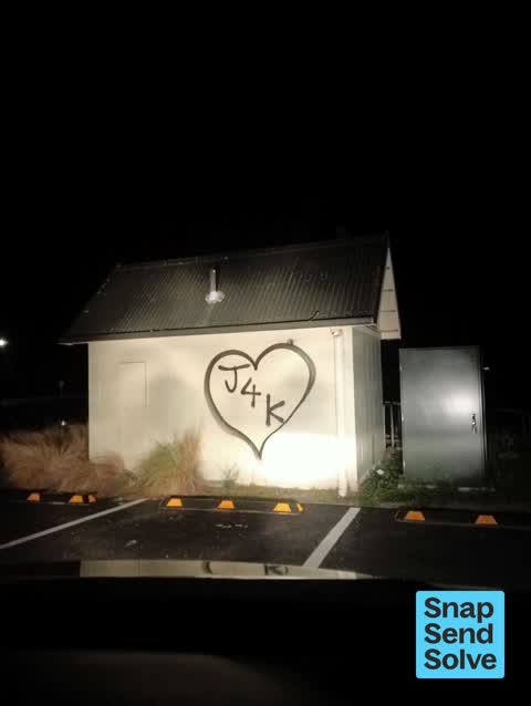 Graffiti on a fence, building or structure — a report photo