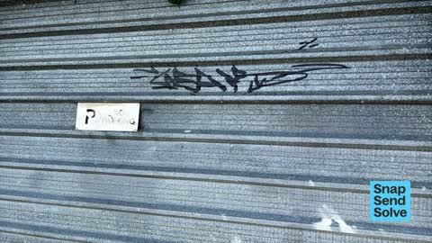 Graffiti on a fence, building or structure, a report photo