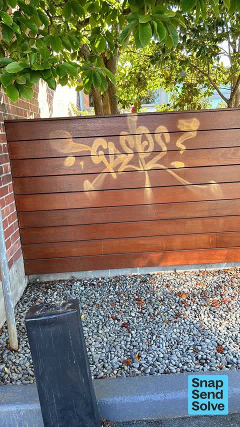 Graffiti on a fence, building or structure, a report photo