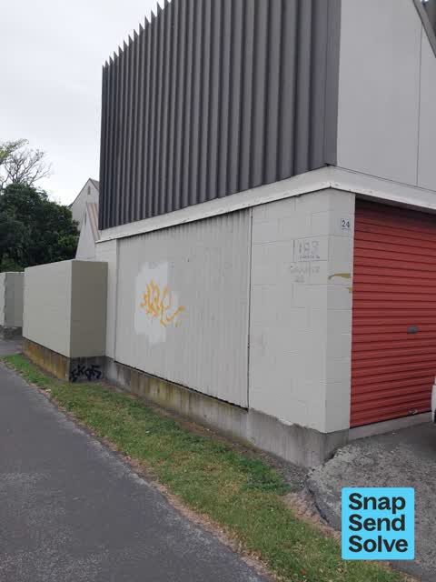 Graffiti on a fence, building or structure, a report photo