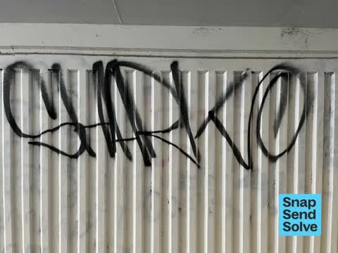 Graffiti on a road, footpath or bridge — a report photo