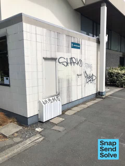 Graffiti on a fence, building or structure, a report photo