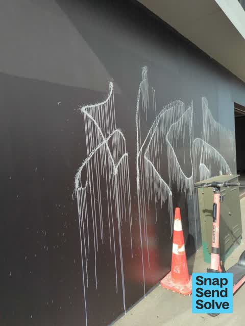 Graffiti on a fence, building or structure — a report photo