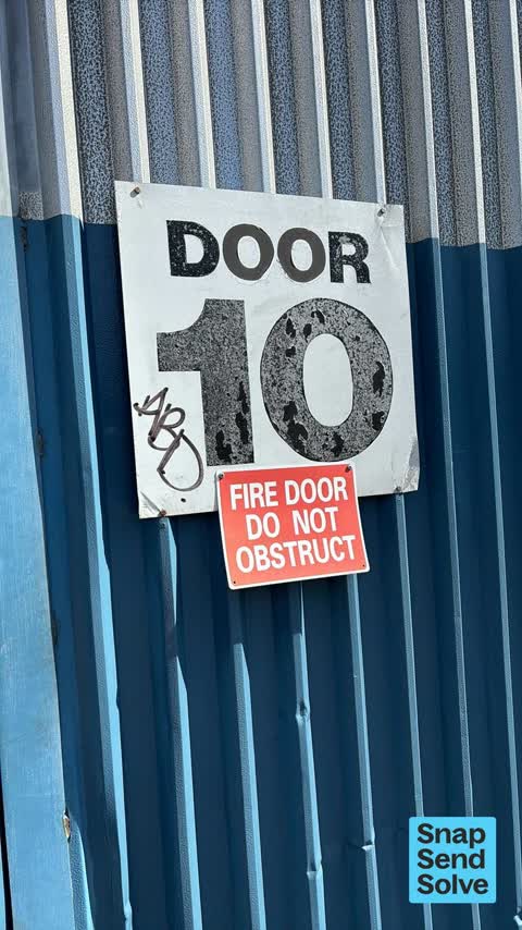 Graffiti on a fence, building or structure, a report photo
