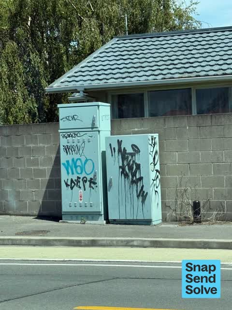 Graffiti on a fence, building or structure — a report photo