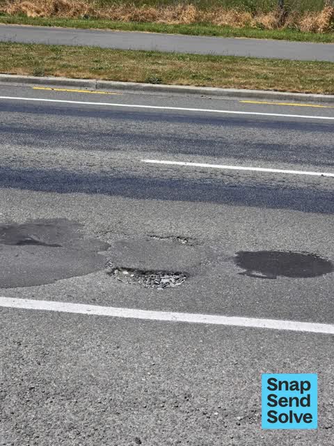Pothole, a report photo