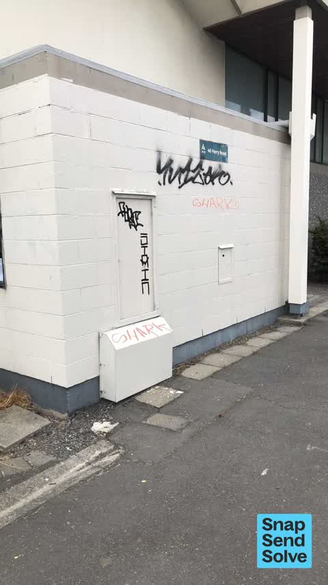 Graffiti on a fence, building or structure, a report photo