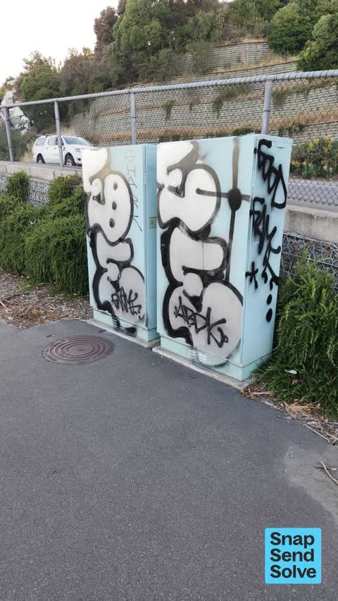 Graffiti on a cabinet, pole or railway asset — a report photo