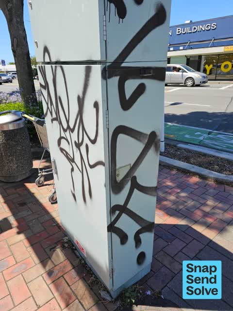 Graffiti on a fence, building or structure — a report photo
