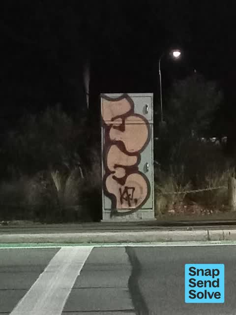 Graffiti on a fence, building or structure — a report photo