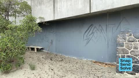 Graffiti on a fence, building or structure — a report photo