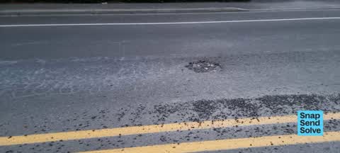 Pothole, a report photo