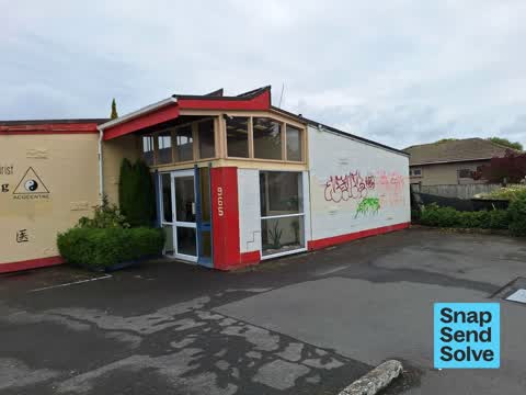 Graffiti on a fence, building or structure, a report photo