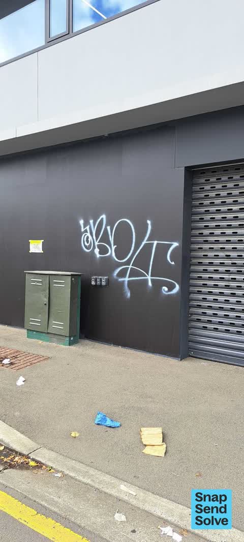 Graffiti on a fence, building or structure — a report photo