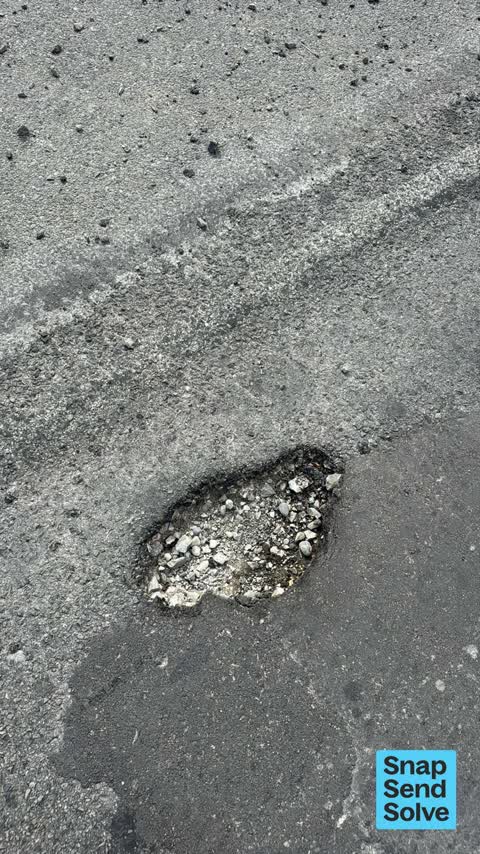 Pothole — a report photo