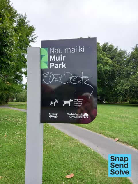 Graffiti on a sign, mural or public art, a report photo