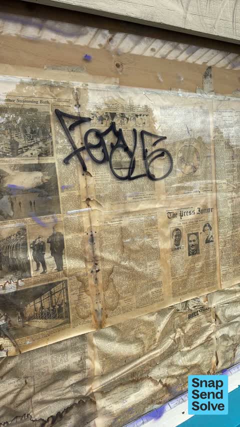 Graffiti on a fence, building or structure — a report photo