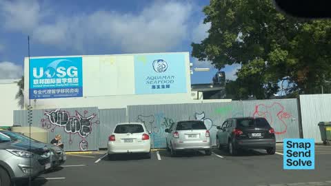 Graffiti on a fence, building or structure — a report photo