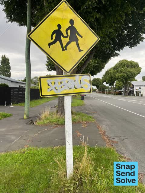 Graffiti on a sign, mural or public art, a report photo